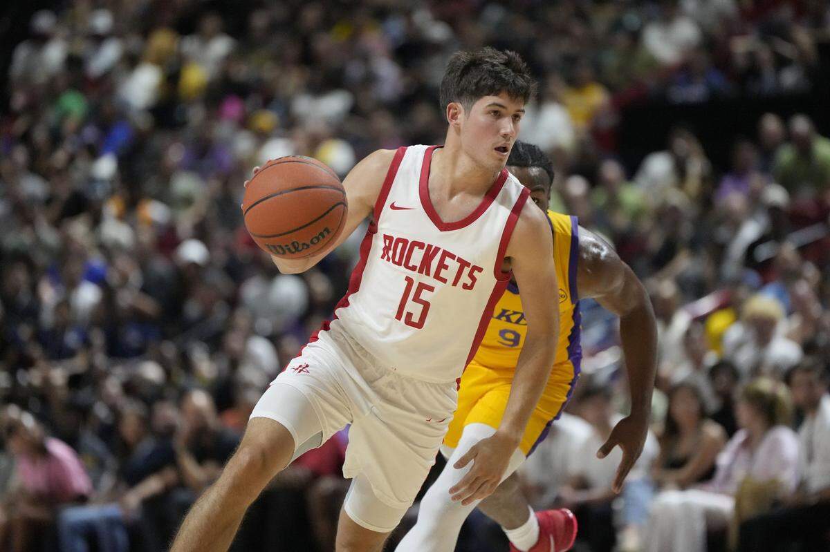 Rockets rookie Reed Sheppard drove past Lakers rookie Bronny James during Sheppard’s NBA Summer League debut in Las Vegas on Friday night. Sheppard led Houston with 23 points in a 99-80 victory.