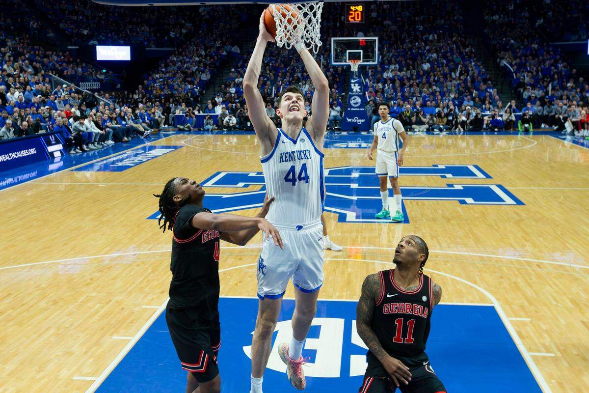 Kentucky Wildcats forward Zvonimir Ivisic (44) jumps to dunk the ball against the Georgia Bulldogs in his first game as a Kentucky Wildcat during the game at Rupp Arena in Lexington, Ky, Saturday, January 20, 2024.