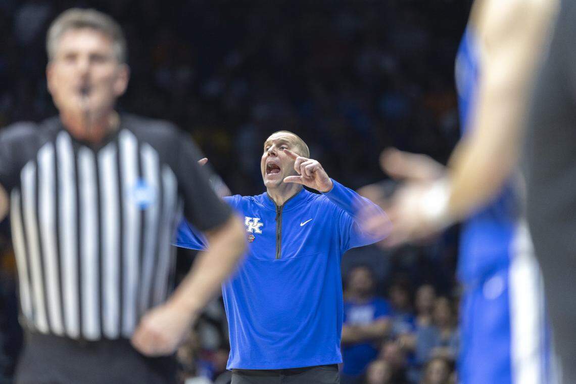 Kentucky head coach Mark Pope calls to his players during Friday’s Sweet 16 game against Tennessee at Lucas Oil Stadium in Indianapolis.