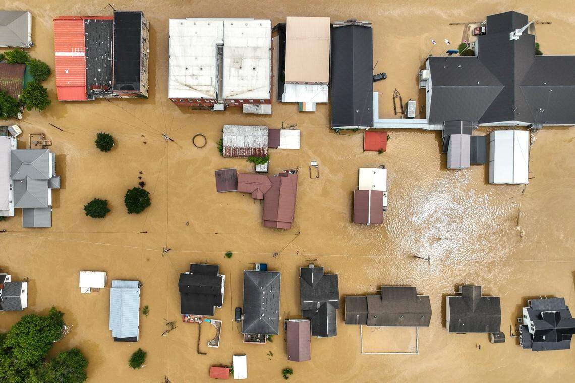 Buildings and roads are flooded in Garrett, Ky., on Thursday, July 28, 2022. Garrett is located in Floyd County.