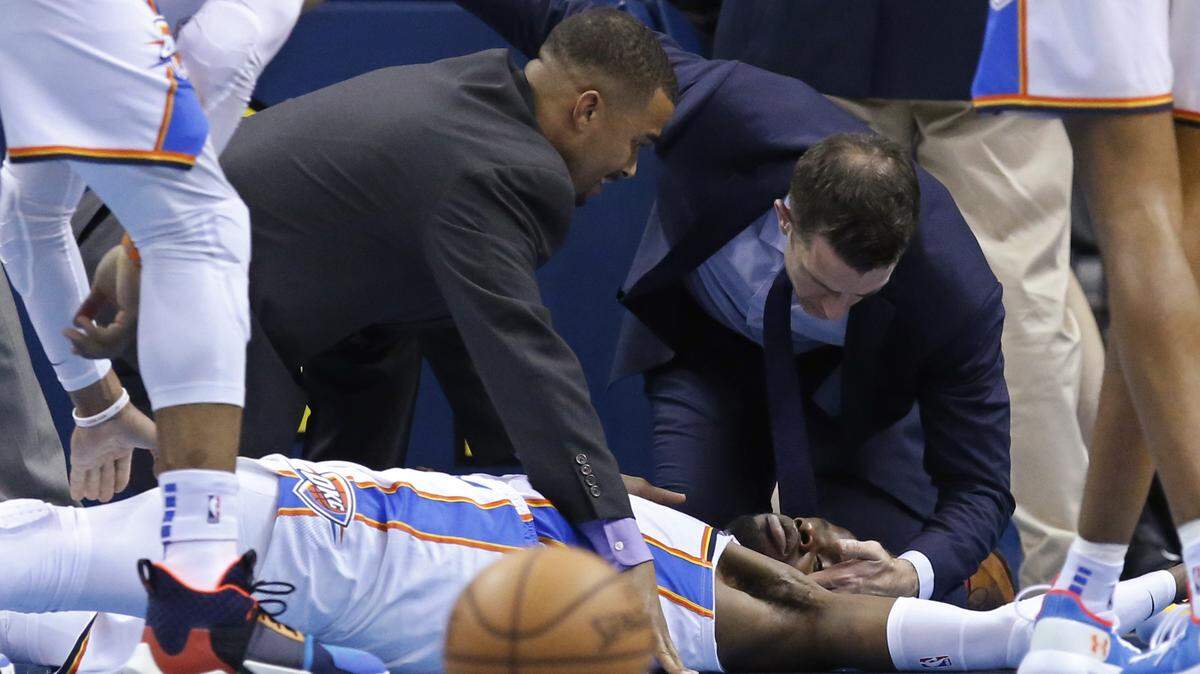 Oklahoma City Thunder forward Nerlens Noel is attended to after an injury during the second half of the team’s NBA basketball game against the Minnesota Timberwolves in Oklahoma City, Tuesday, Jan. 8, 2019. Noel was taken off the court. (AP Photo/Sue Ogrocki)