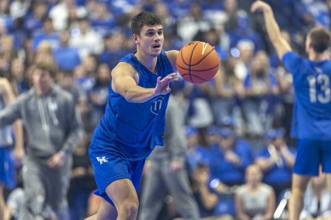 Kerr Kriisa passes the ball during drills on Big Blue Madness night in Rupp Arena.