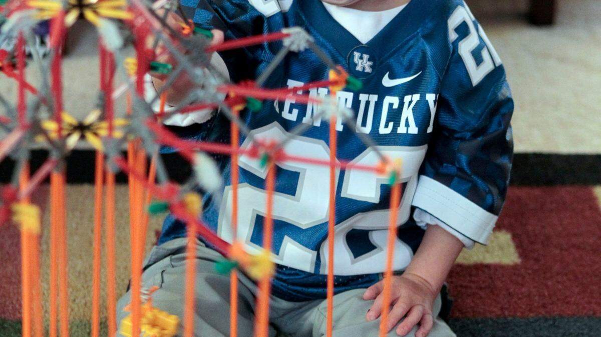Zach Pickard clowned around while playing with a new toy in his home in Lexington, Ky., Wednesday, October, 19, 2011. Zach Pickard was diagnosed with Progeria, an accelerated aging syndrome, in December 2007 at the age of 11 months. Charles Bertram | Staff