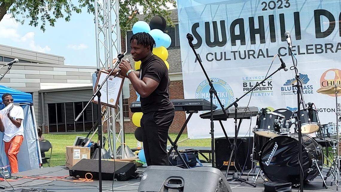 Elisha Mutayongwa displayed a proclamation from the city of Lexington, Ky., at Swahili Day, June 3, 2023.