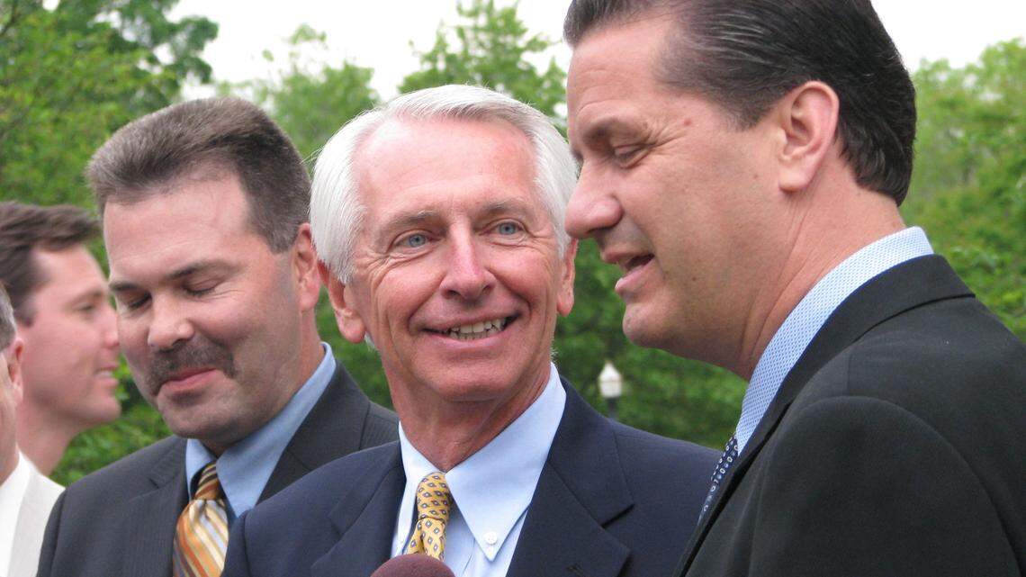 In May 2009, new UK John Calipari, right, joked with Gov. Steve Beshear, center, and  Agriculture Secretary Richie Farmer about the 2011 governor's race.  
