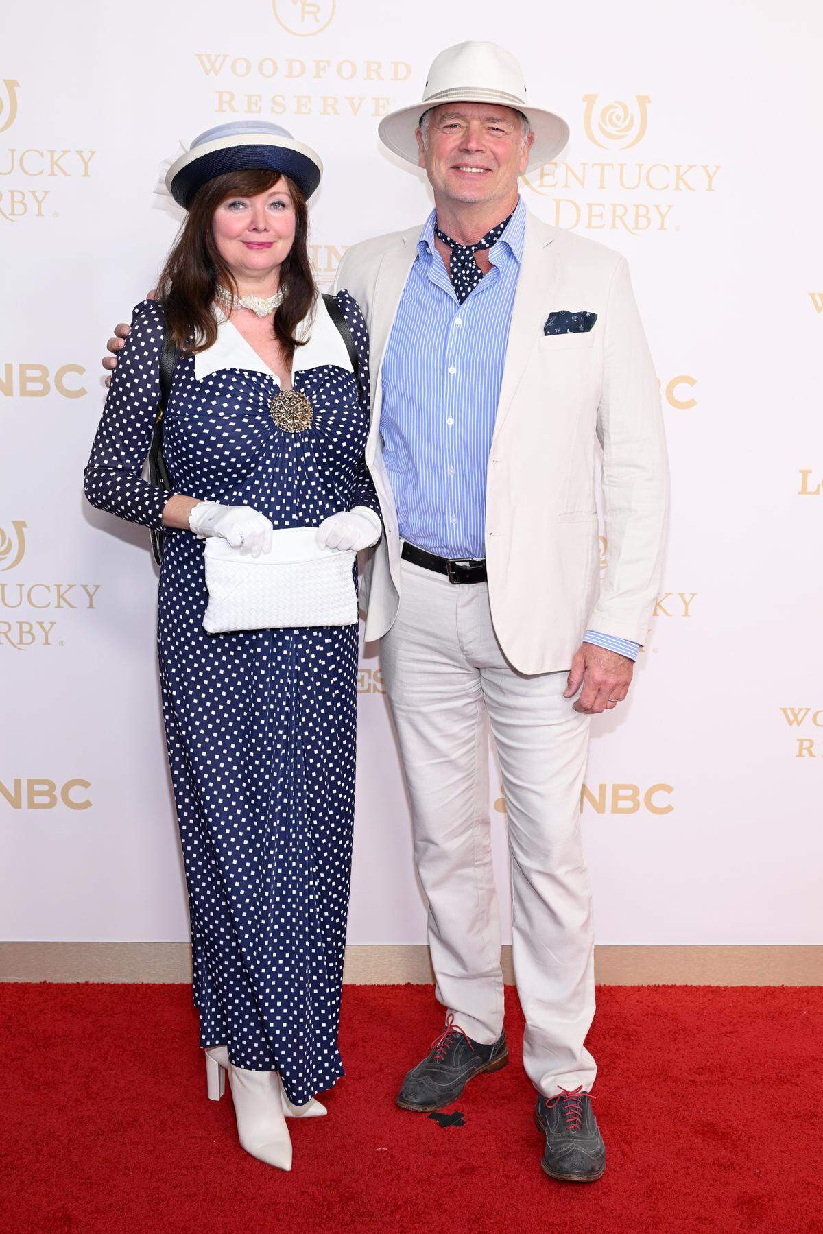 LOUISVILLE, KENTUCKY - MAY 02: (L-R) Dee Dee Sorvino and John Schneider attend the Kentucky Derby 152 at Churchill Downs on May 02, 2026 in Louisville, Kentucky. (Photo by Daniel Boczarski/Getty Images for Churchill Downs)