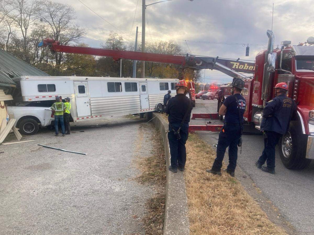 A crew cab dually truck pulling a 30-foot gooseneck horse trailer loaded with four horses drove into the Curbside Bar at 2314 Paris Pike Saturday afternoon.