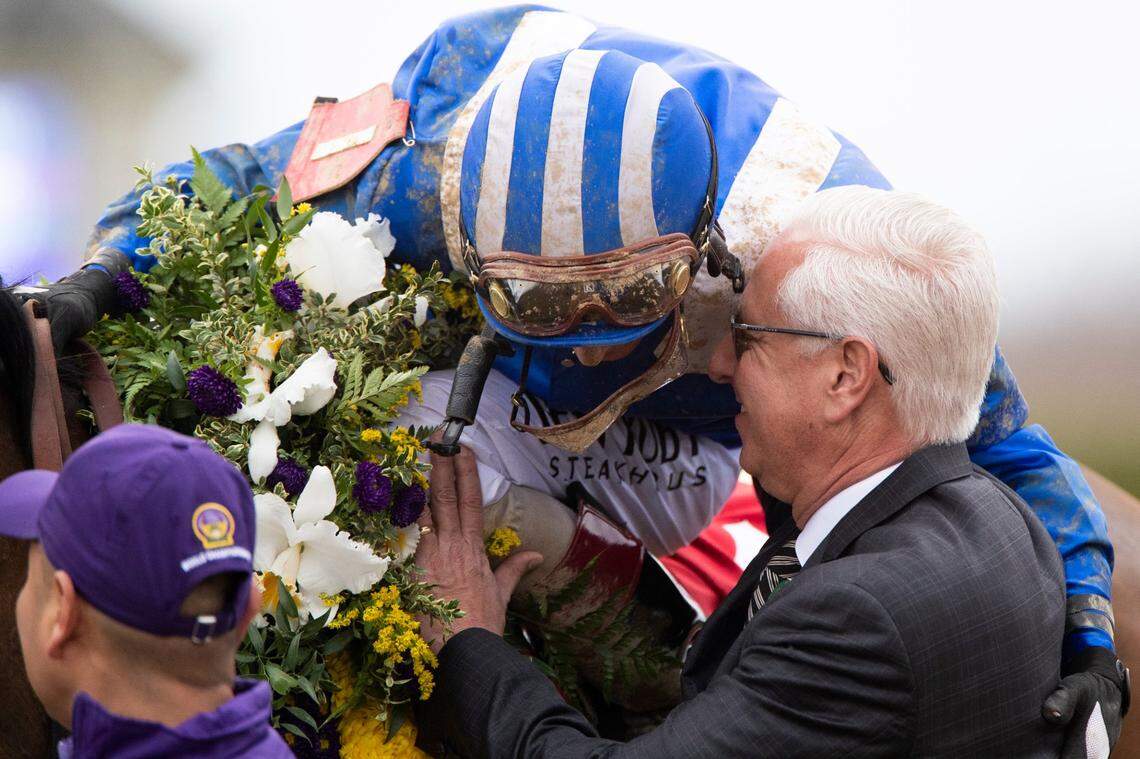 Trainer Todd Pletcher and jockey John Velazquez celebrate Malathaat’s narrow victory in the Breeders’ Cup Distaff. “I’m too old for those type of finishes these days,” Pletcher said.