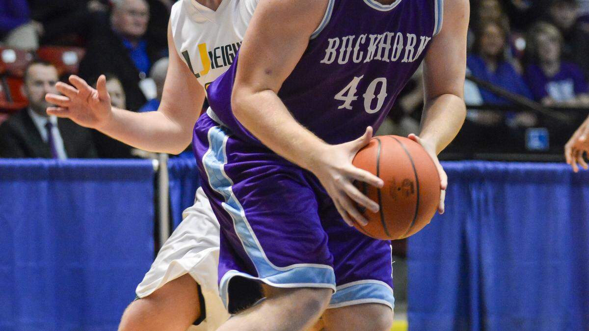 Buckhorn's Caleb Estep shoots against University Heights' Justin Womack, during the opening round of the boys Touchstone Energy All-A Classic, in Frankfort, Thursday, January 29, 2015.
Photo by Tim Webb