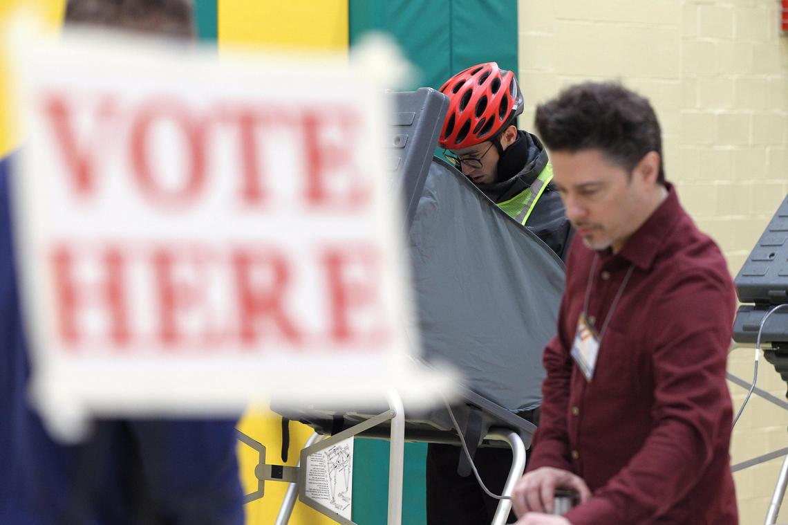 A voter cast his ballot at the Duke precinct Tuesday morning at Morton Middle School.