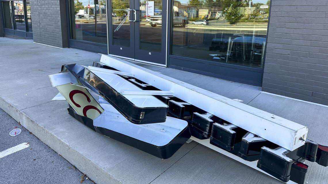The sign for Maple Street Biscuit Company lays in front of the closed restaurant after it was taken down, Thursday, Sept. 18, in Lexington, Ky.
