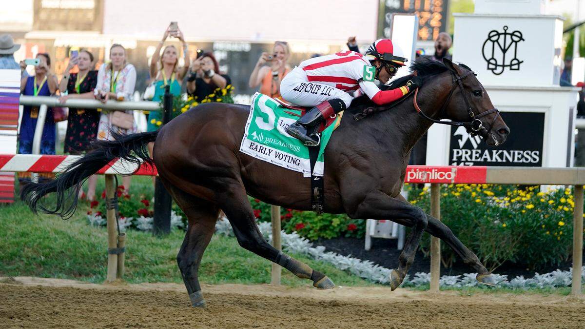 Jose Ortiz atop Early Voting wins the 147th running of the Preakness Stakes at Pimlico Race Course in Baltimore on Saturday.