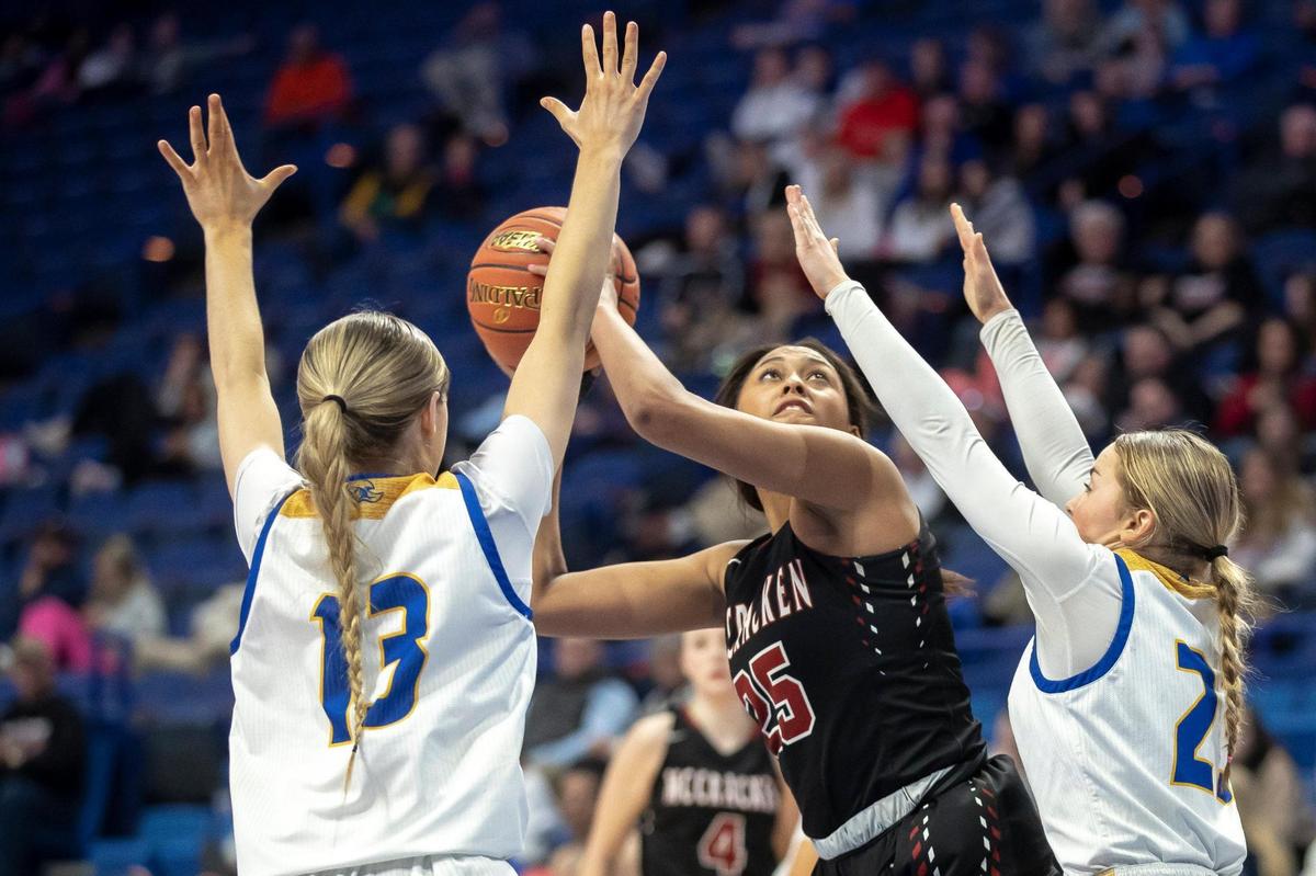 McCracken County’s Destiny Thomas (25) tried to shoot over Bethlehem’s Carlie Thurmond (13) and Khloe Young (23) on Thursday. Thomas led McCracken County with 27 points and seven rebounds.
