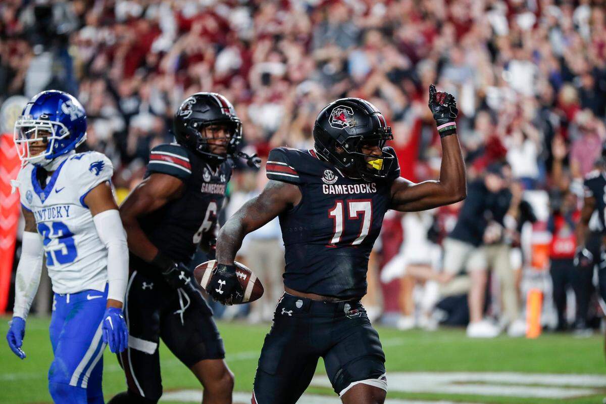 South Carolina wide receiver Xavier Legette (17) celebrates scoring against Kentucky during Saturday’s game.