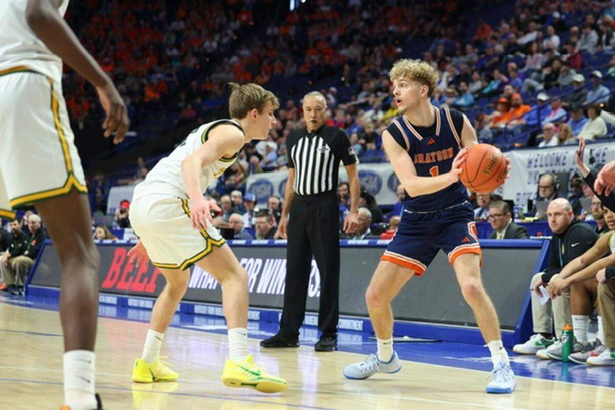 Grayson County’s Jagger Mardis looks for a pass around St. Xavier’s Connor Klein during the UK HealthCare Boys’ Basketball Sweet 16 state tournament semifinals at Rupp Arena on Saturday.