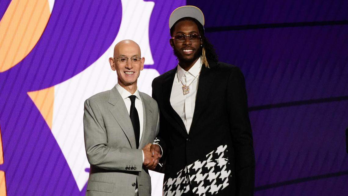 Isaiah Jackson, right, poses for a photo with NBA Commissioner Adam Silver after being selected 22nd overall by the Los Angeles Lakers during the NBA basketball draft, Thursday, July 29, 2021, in New York.
