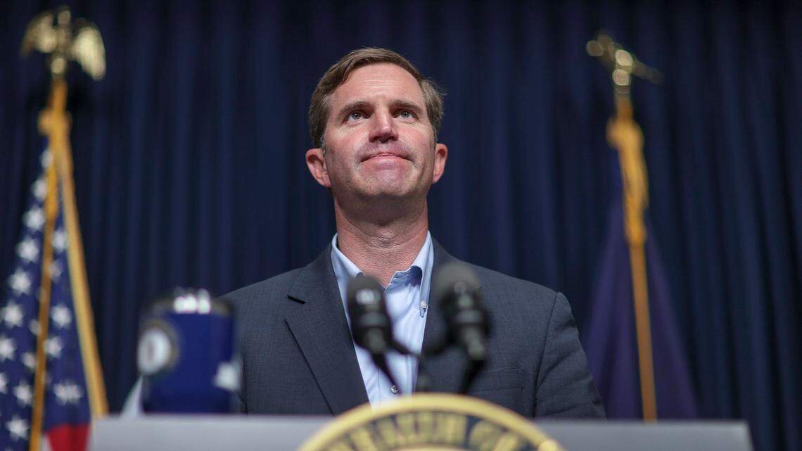 Kentucky Gov. Andy Beshear reacts during a media briefing about the COVID-19 pandemic at the state Capitol in Frankfort, Ky., on Monday, Aug. 23, 2021.