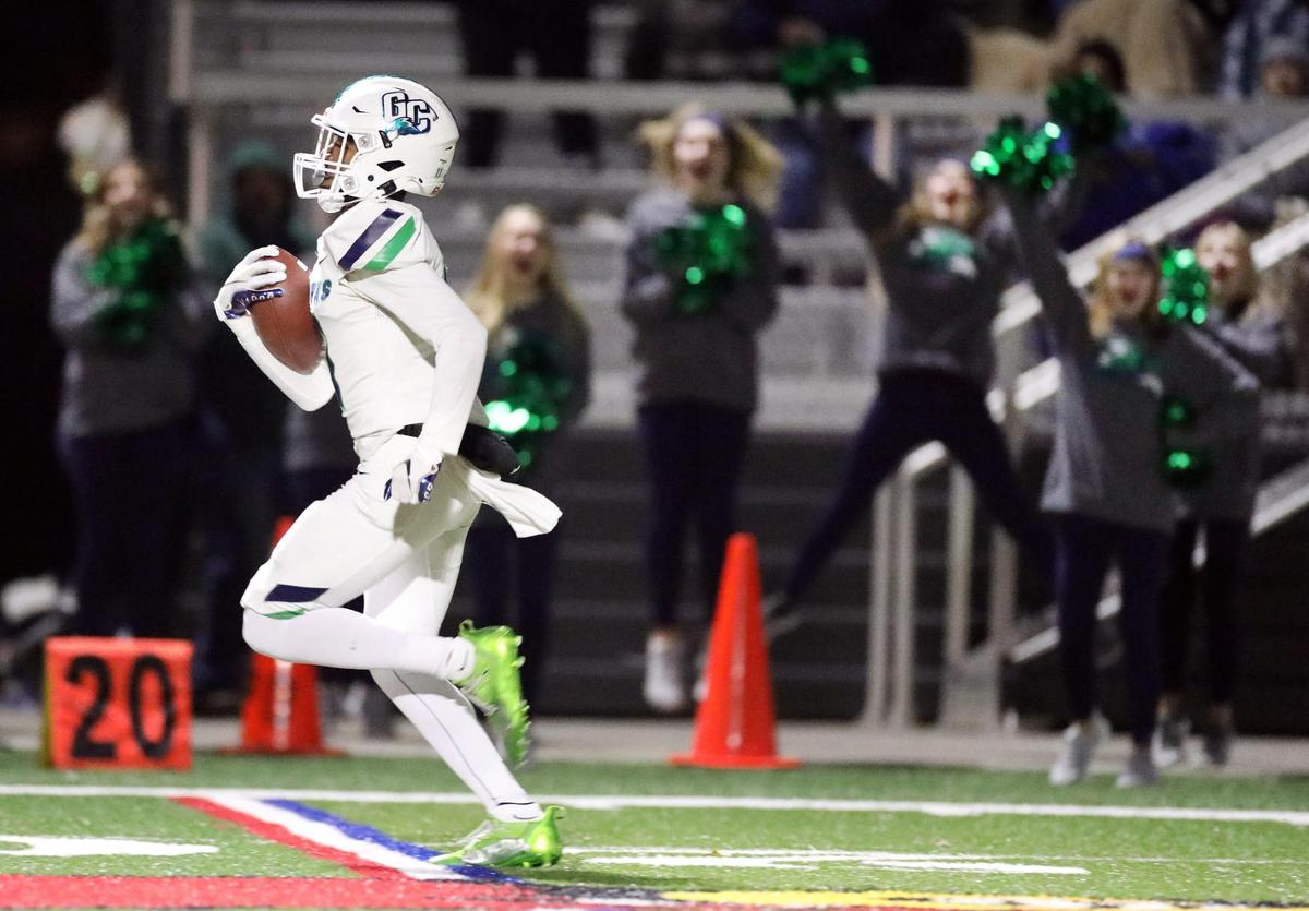 Great Crossing’s Zackarrey Kelley (11) raced to the endzone for a score after catching a wide-open 61-yard pass in the first half Friday against Scott Co.
