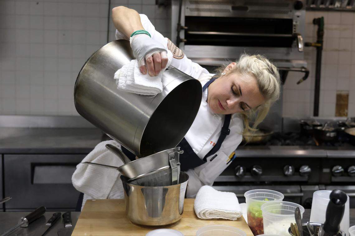 Chef Kelsey Barnard Clark burned her right hand but kept on cooking.