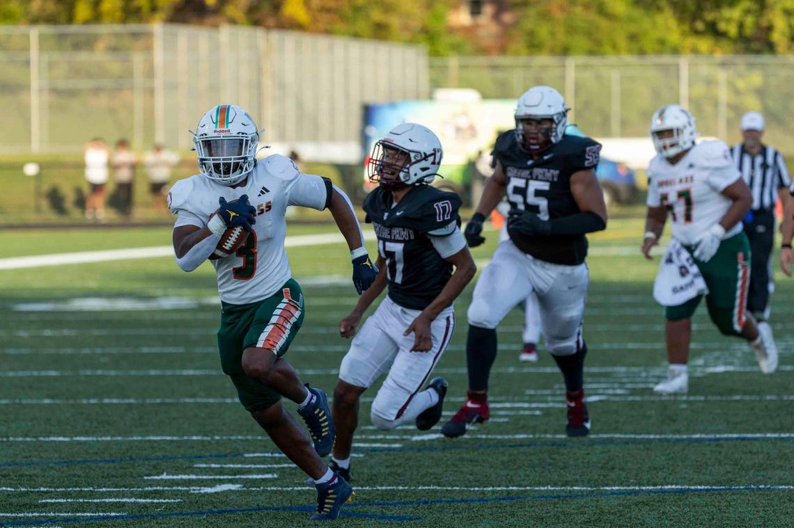 Frederick Douglass running back Pharo Watts (3) goes in for a touchdown during the Broncos’ 50-14 win at Tates Creek High School on Friday.