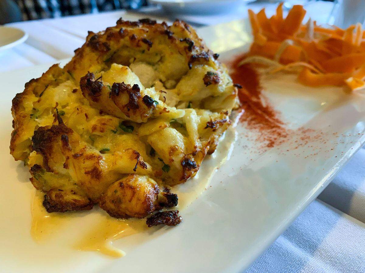 The Jumbo Lump Crab Cake with mustard aioli and hot smoked paprika appetizer at Tony’s of Lexington steakhouse.