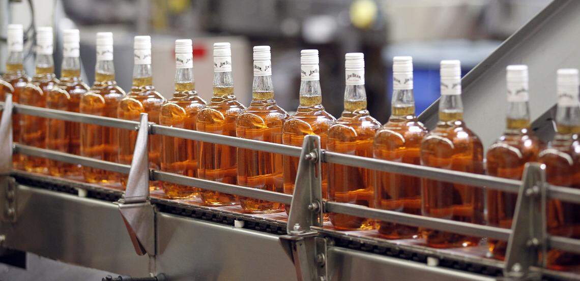 While bourbon tourism is shut down, bottling and distilling are continuing.