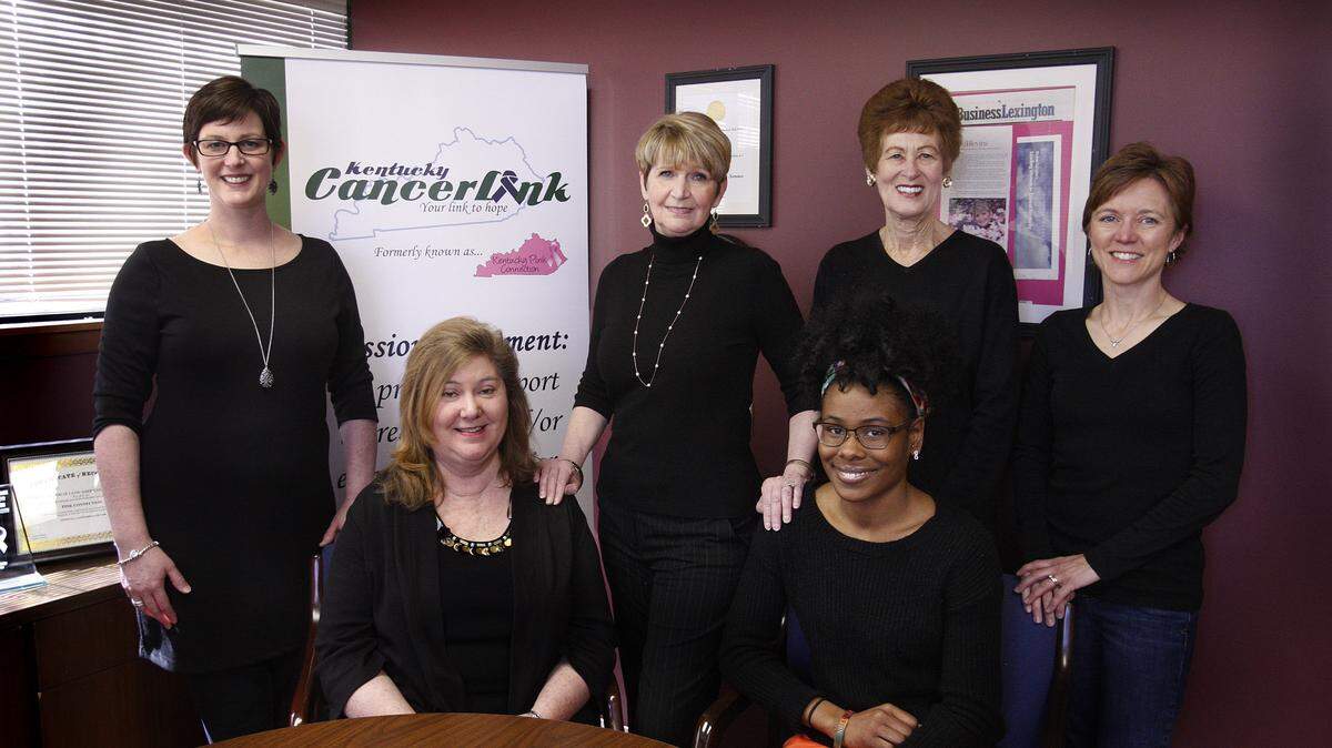 Kentucky CancerLink Executive Director Vicki Blevins, standing second from left, joined staff and volunteers standing, from left, Melissa Karrer, Toni Davis and Carla Washnock; and seated from left, Tami Kelder and Brittany Lindsey.