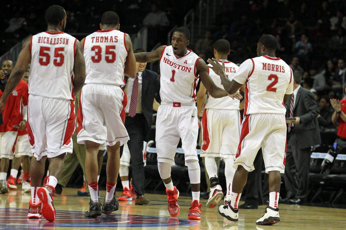Mikhail McLean (1) played with Houston from 2010 through 2015 and then was a member of the Cougars staff for six seasons after that.
