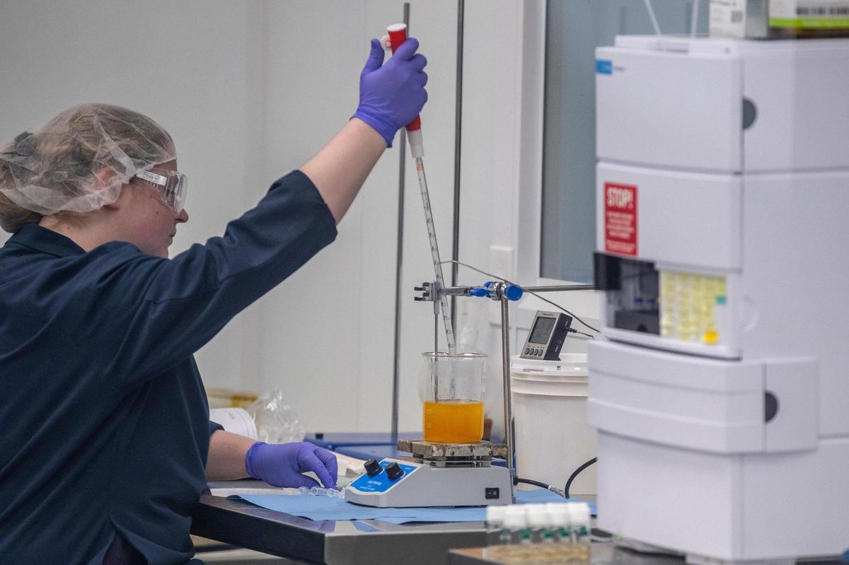 Tori Destremps, senior laboratory technician, works in the lab at Kentucky Heritage Hemp in Nelson County, Ky., on Wednesday, March 22, 2023.