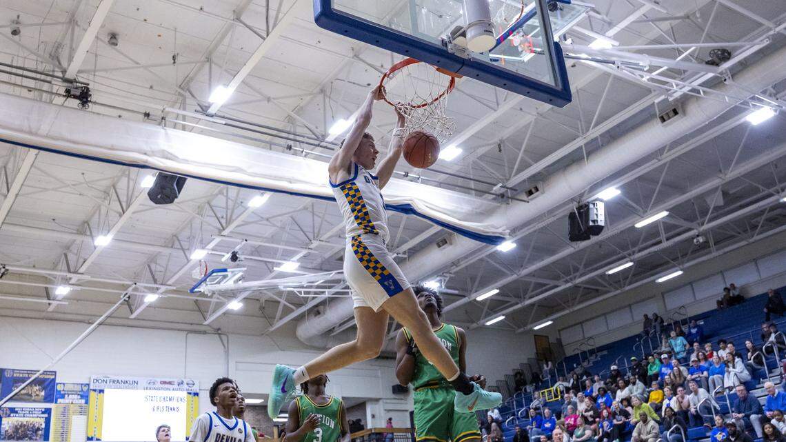 Henry Clay's Jackson Stephan (1) dunks the ball during the Blue Devil's 70-67 overtime win over Bryan Station in a KHSAA basketball game, Friday, Feb. 13, 2026 at Henry Clay High School in Lexington, Ky.