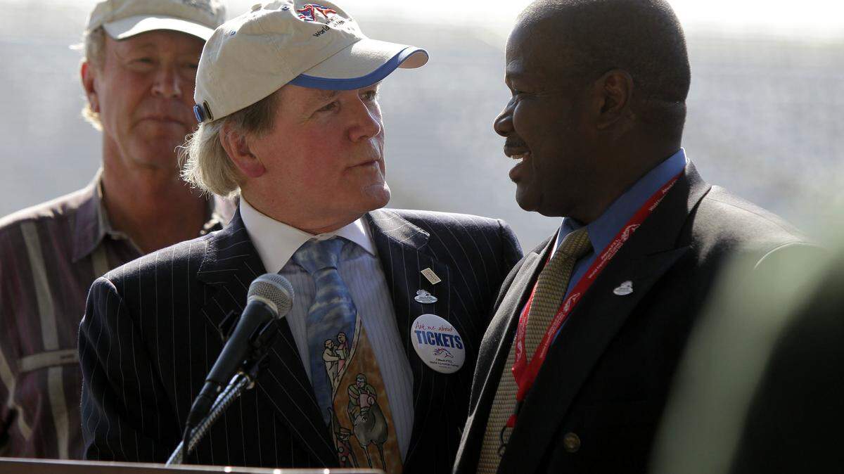 Alltech President Pearse Lyons, center, and executive producer Everett McCorvey, right, announced the opening ceremony lineup, which will include Muhammad Ali. Page A3