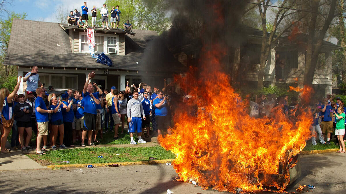 UK fans celebrate the 2012 Regional Championship win, March 25,  2012 on State Street in Lexington. Photo by Jonathan Palmer