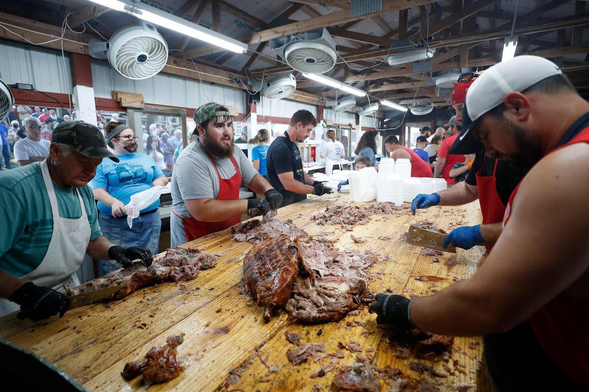 About 20,000 pounds of pork and mutton is prepared for the day during the 141st Fancy Farm Picnic at St. Jerome Catholic Church in Fancy Farm, Ky., Saturday, Aug. 7, 2021.
