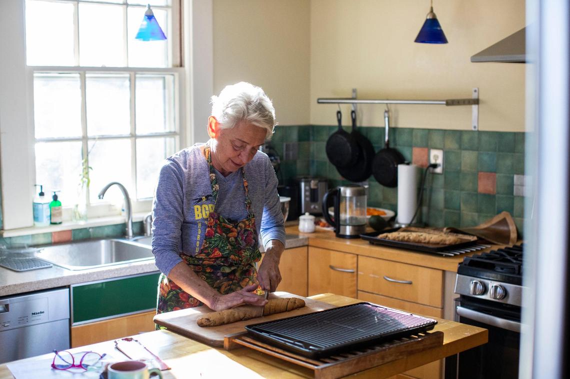Slice the biscotti loaf on the diagonal, a few slices at a time.
