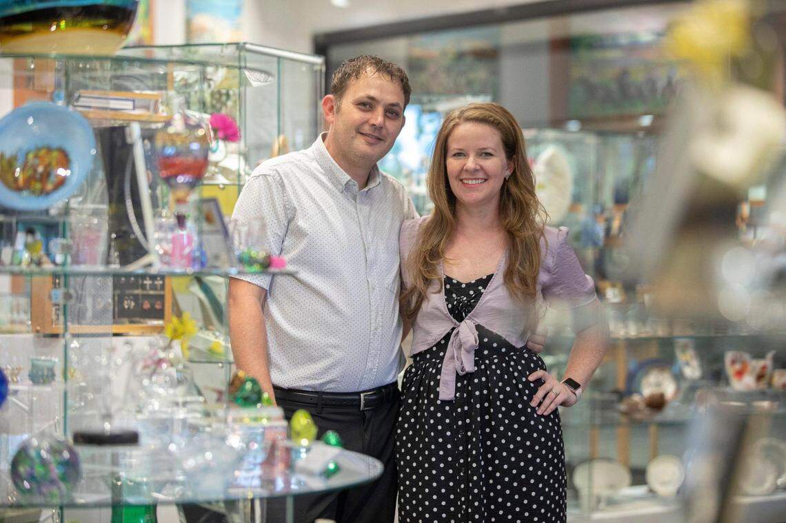 Artique Gallery co-owners C.W. and Jamie Hurt posed for a portrait inside their store at Lexington Green on Friday, May 17, 2019. The store reopened in Fayette Mall in June 2019.