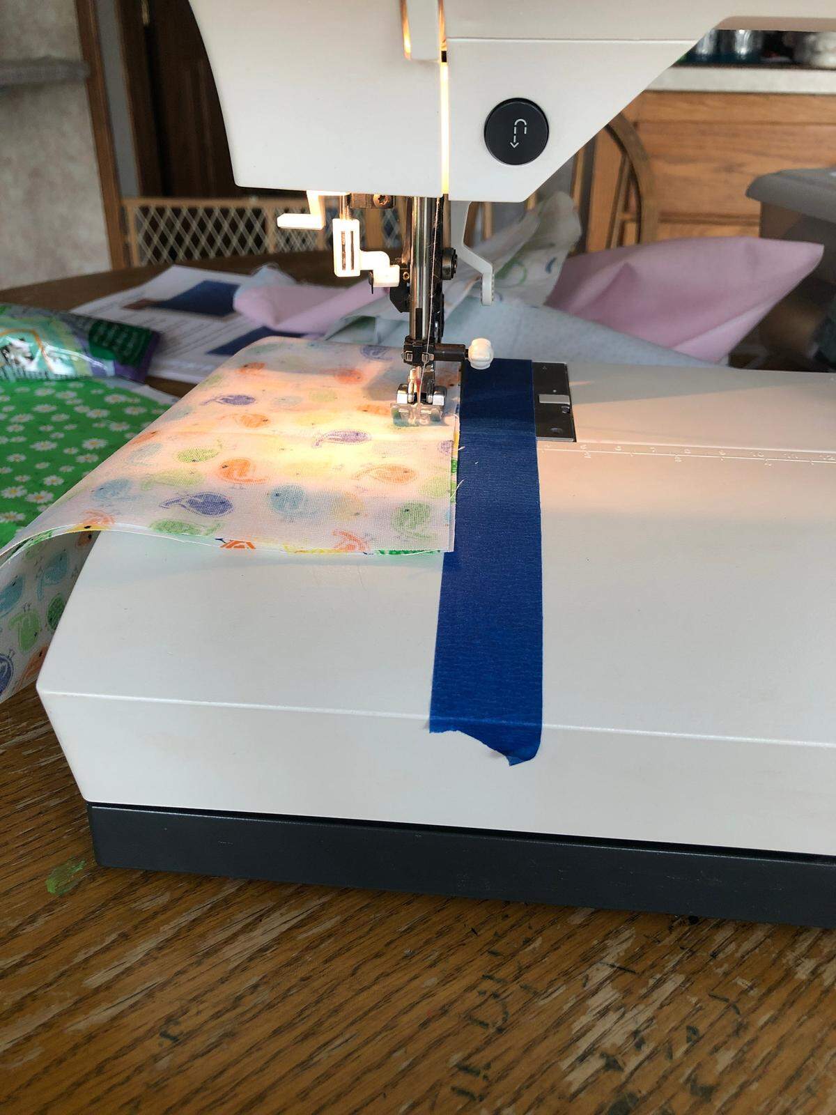 One of the 15 masks that Heather Russell of Cynthiana made on Friday sits on the sewing machine.