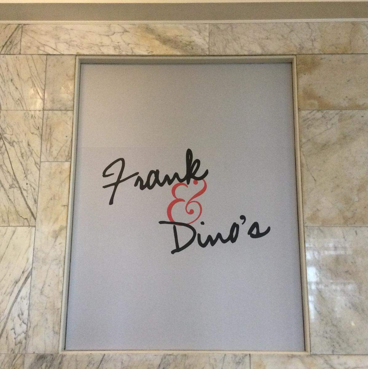 The sign for Frank & Dino’s in the lobby of the Security Trust Building on West Short Street. The 150-year-old building was renovated to turn the former bank into an elegant new restaurant space.