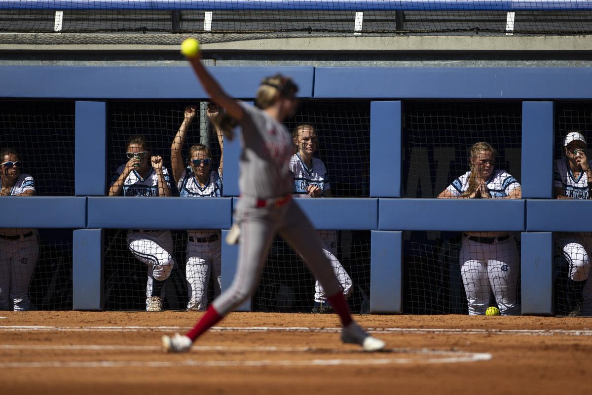 Central Hardin players watched as Pendleton County’s Kaylee Bruener pitched during Friday’s state tournament opener.