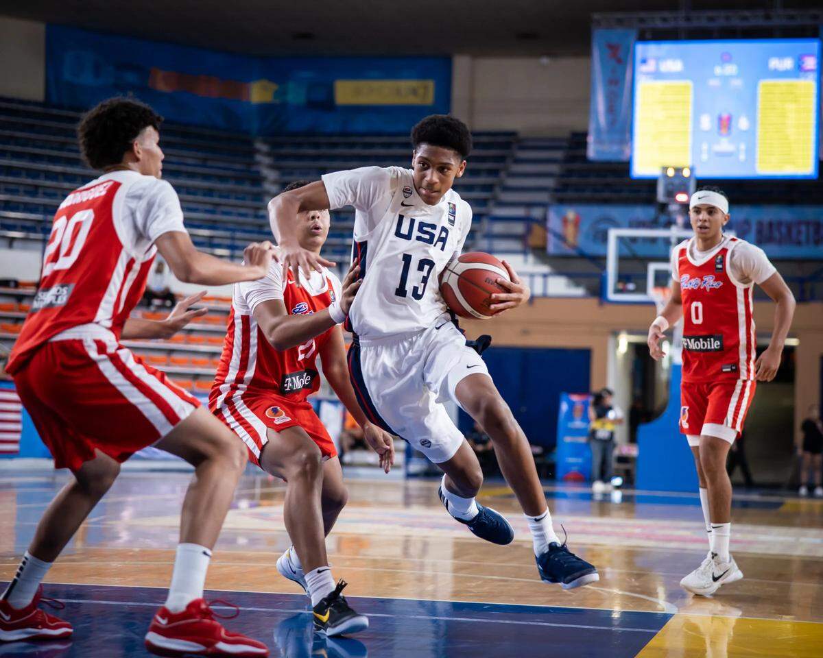 Class of 2027 college basketball recruit Marcus Spears Jr. (13) is ranked by 247Sports as the No. 1 prospect in the 2027 recruiting group.