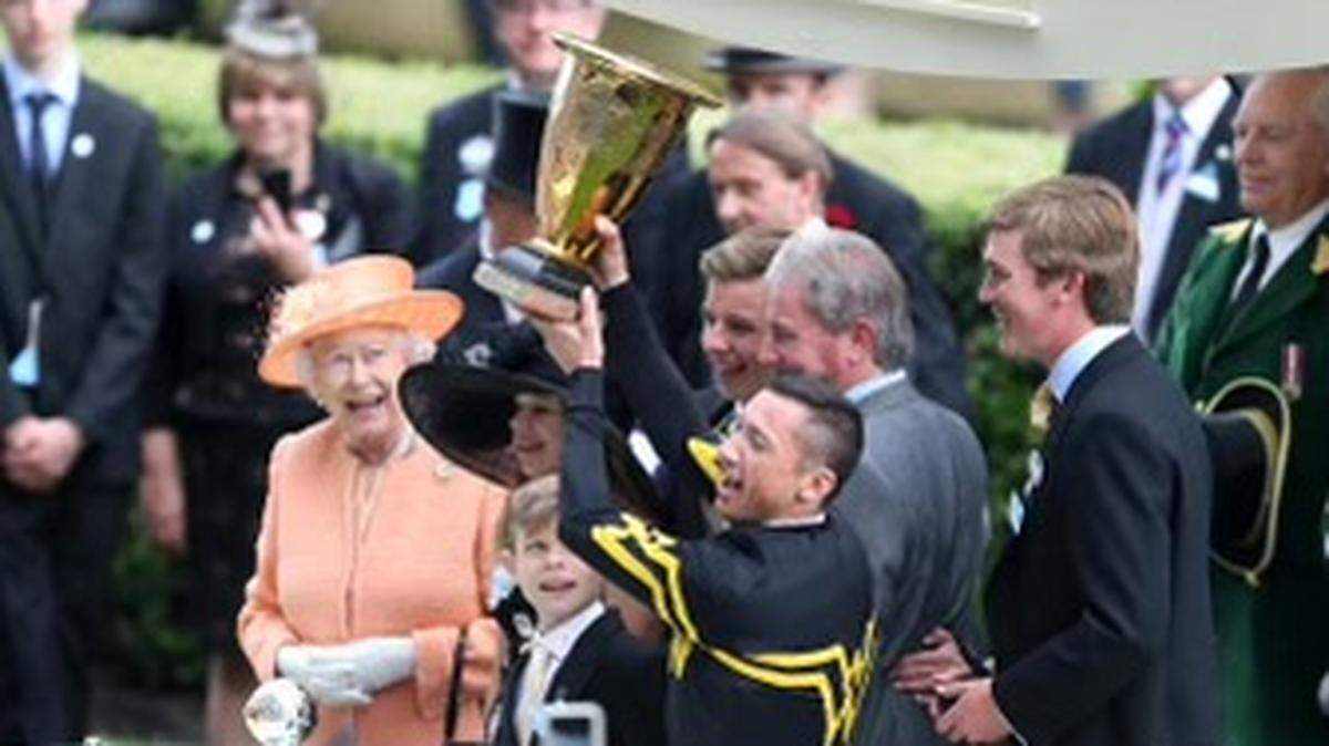 Wesley Ward and his family receive a trophy for winning a Royal Ascot Race.