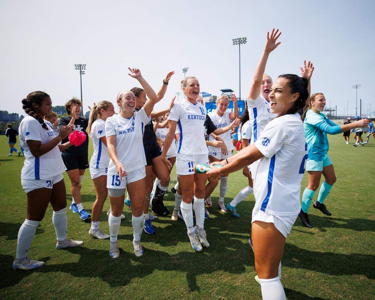 Kentucky players celebrate after defeating ninth-ranked UCLA 2-0 at the Wendell and Vickie Bell Soccer Complex in Lexington on Sunday.