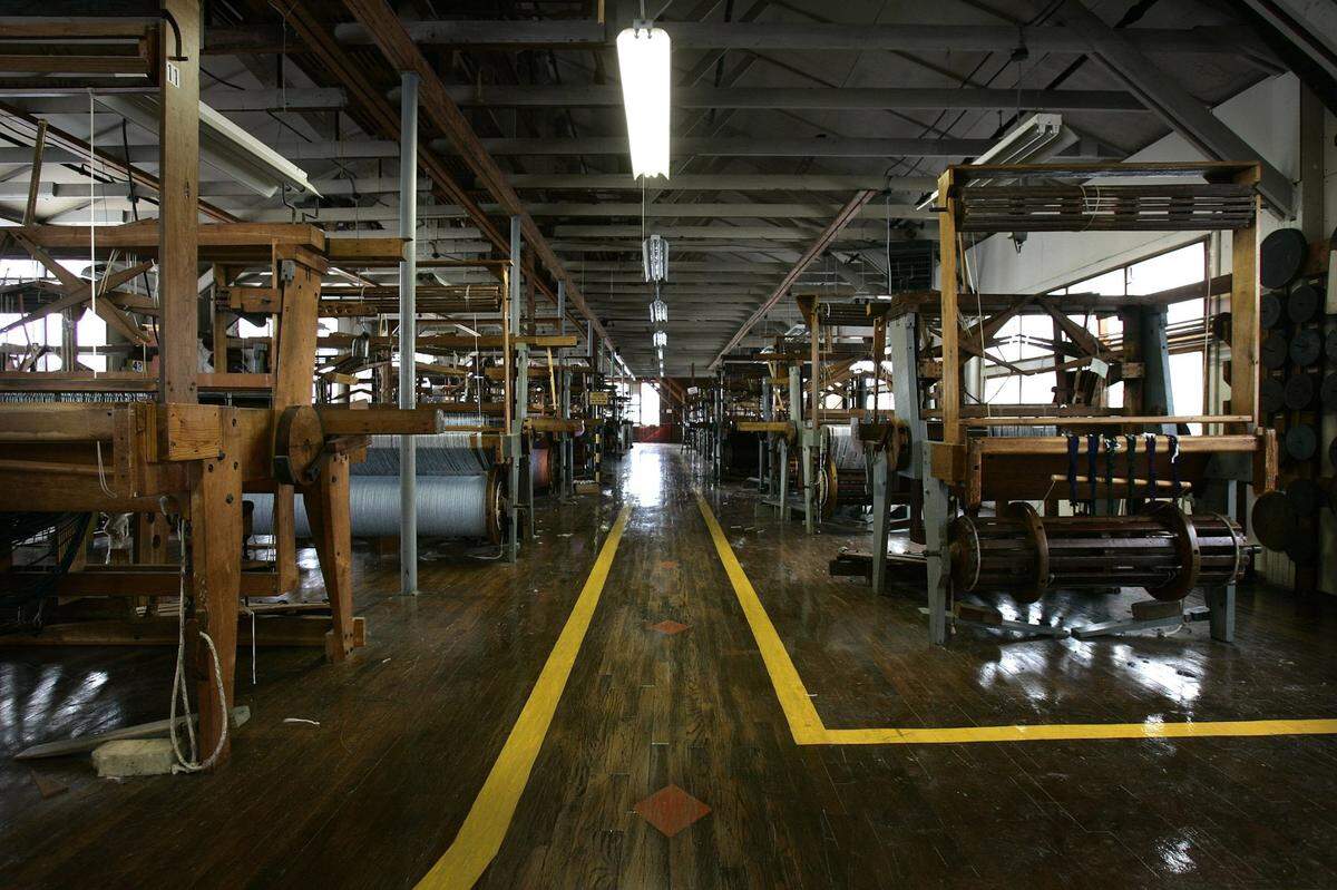 The empty room of looms at Churchill Weavers which closed in 2007 after 85 years.