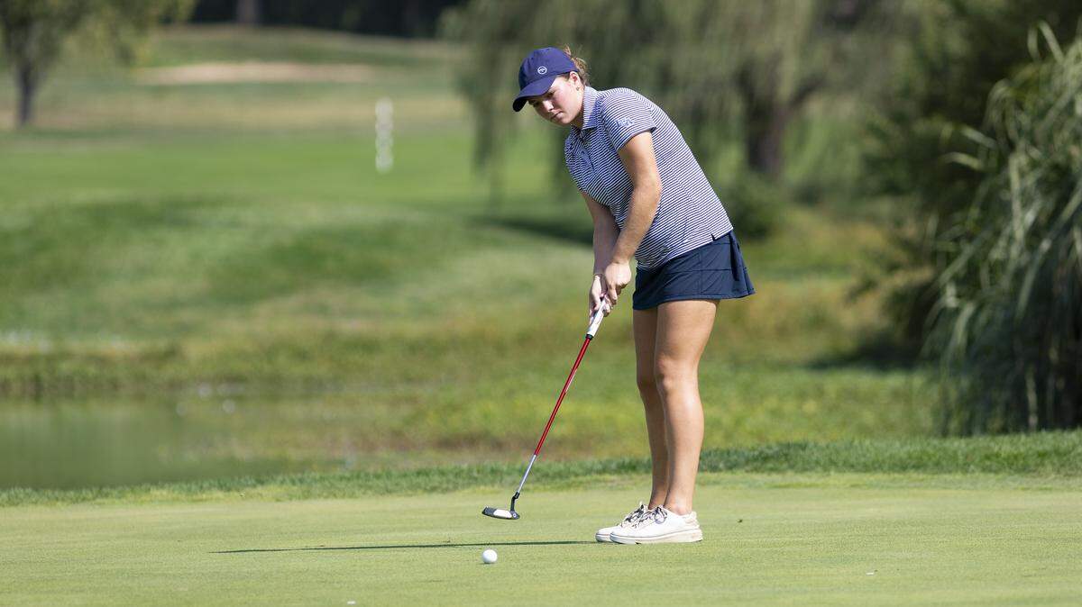 Lexington Christian’s Carter Lankford watches her putt approach the hole on the 16th green of the University Club of Kentucky’s Big Blue Course during the All State Championships on Sunday.