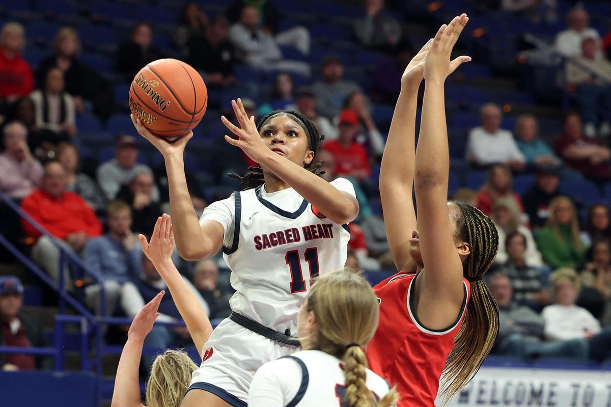 Sacred Heart’s ZaKiyah Johnson posted a double-double against George Rogers Clark to advance to the title game.