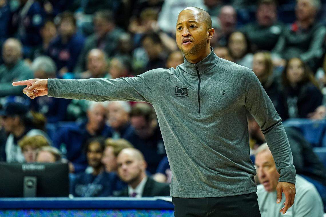Nov 18, 2022; Storrs, Connecticut, USA; North Carolina-Wilmington Seahawks head coach Takayo Siddle watches from the sideline as they take on the Connecticut Huskies at Harry A. Gampel Pavilion. Mandatory Credit: David Butler II-USA TODAY Sports