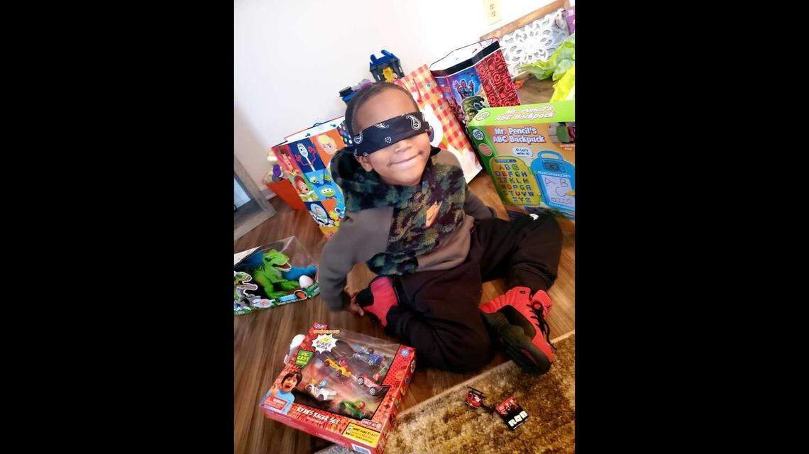 Malakai Roberts sat with his gifts on his 6th birthday. Roberts was permanently blinded when he was unexpectedly shot by someone outside his home on Dec. 21, 2020.