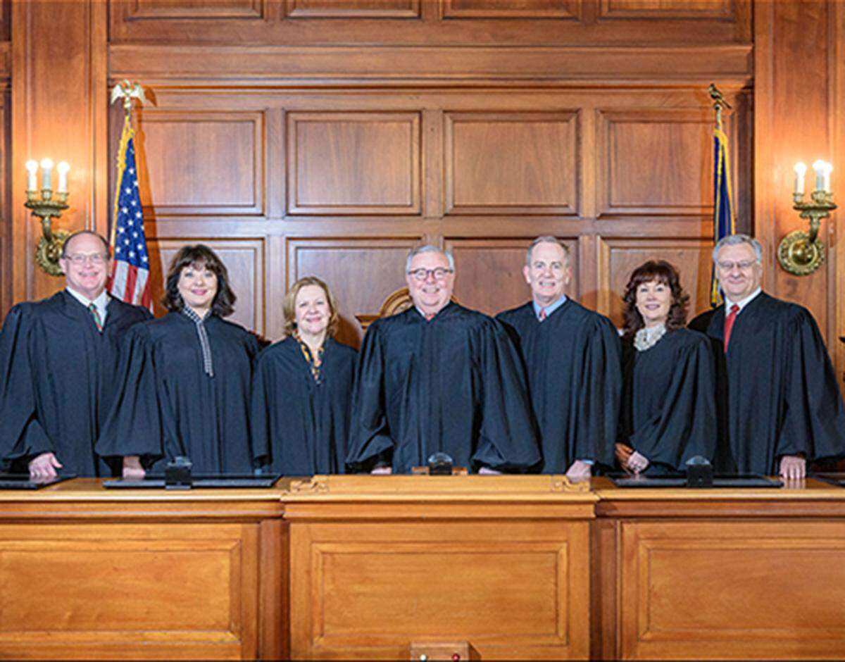 The Kentucky Supreme Court is photographed following the addition of Justice Christopher Shea Nickell, Thursday, Dec. 12, 2019, in the Supreme Court Courtroom in Frankfort, Ky. (AOC photo/Brian Bohannon)