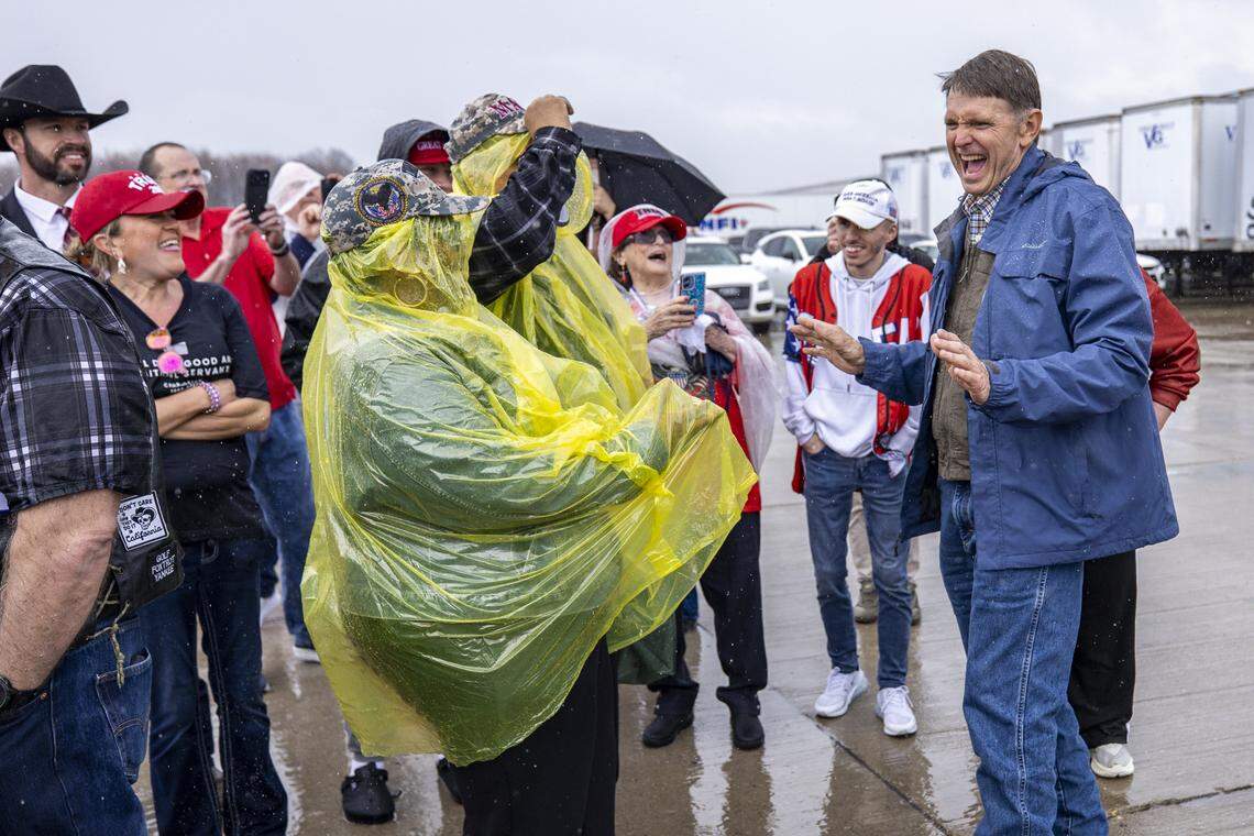 Congressional candidate Ed Gallrein talks with people waiting in line before President Donald Trump’s visit at Verst Logistics in Hebron, Kentucky, on Wednesday, March 11, 2026.