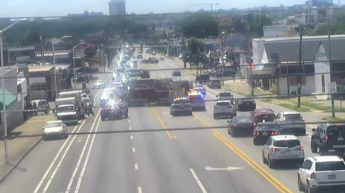 Part of Winchester Road shut down after vehicle crashes into adult video store building
