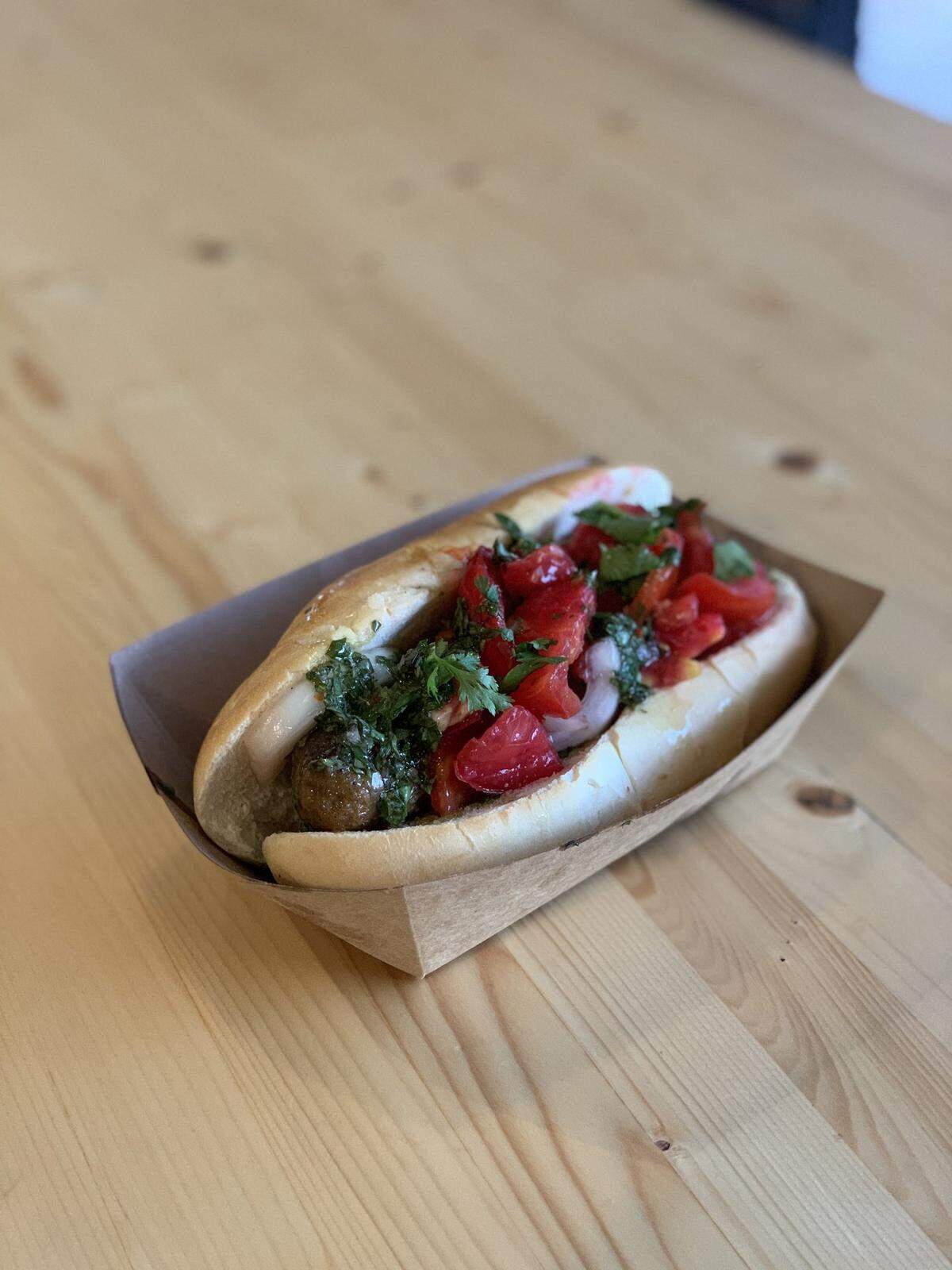 Favor Kitchen will have Choripan – Pastured pork chorizo, chimichurri, red onion curtido with crusty bread.